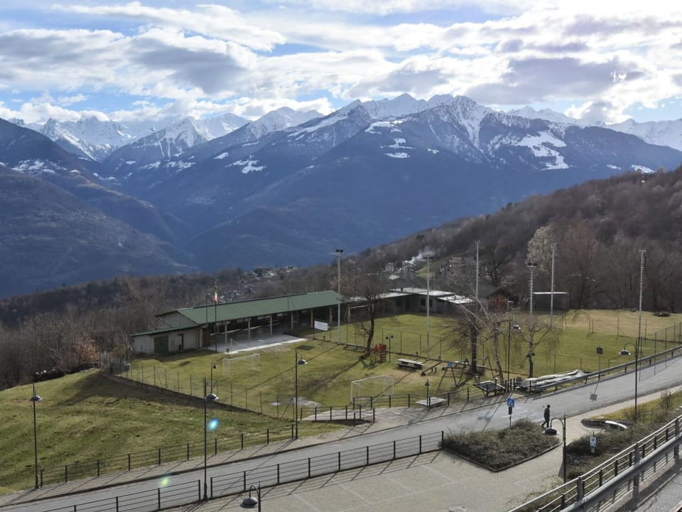 Plant, Sky, Building, Window, Tree, Urban Design, Body Of Water, Condominium, Arecales, Cloud