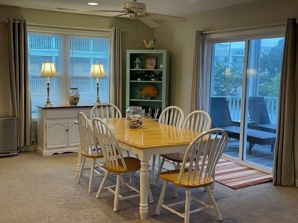 Seats 6 and has additional seating for 4 at the kitchen island