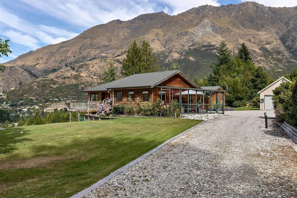 Exterior View: Nestled among stunning mountains, enjoy outdoor serenity in a lush garden!