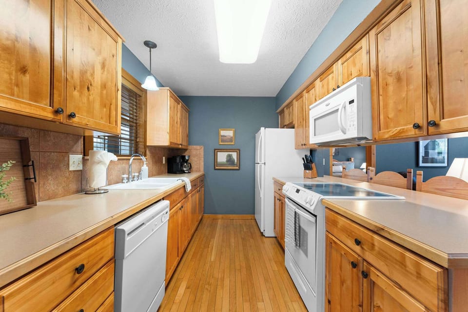 The kitchen has pots, pans, and most everything you would need to cook up your favorites!