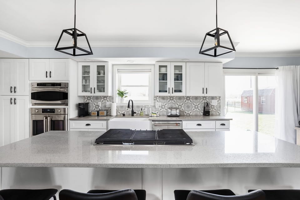 Executive style kitchen with high end appliances and all the needs for a home cooked meal. 