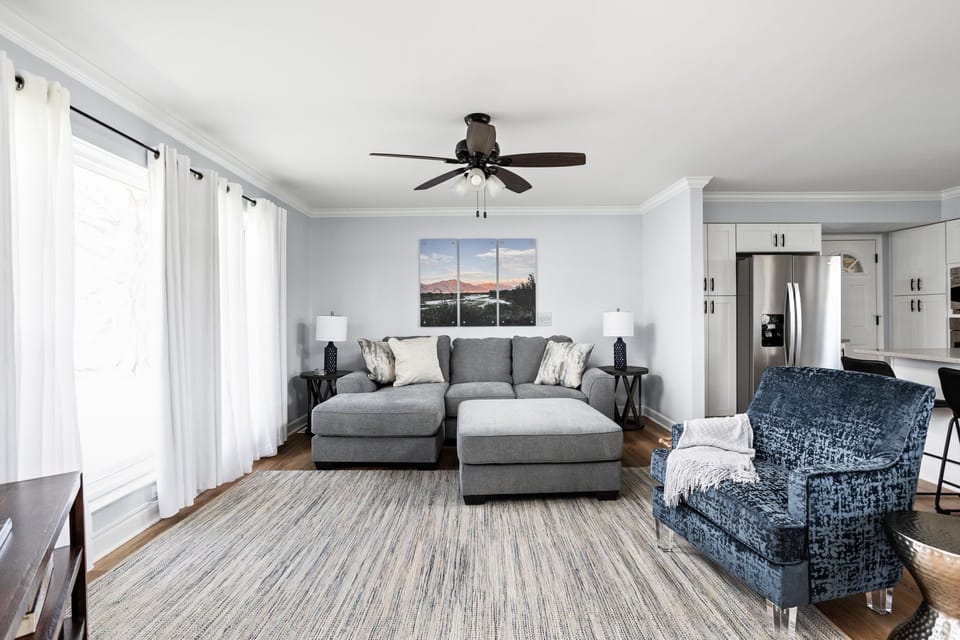 Main level sitting area includes a 65" Smart TV with live cable. 