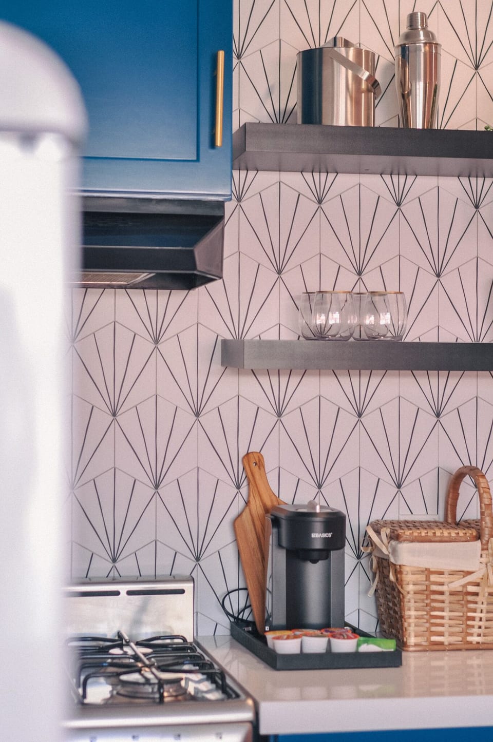 Create culinary magic in this stylish Palm Springs kitchenette, complete with retro flair and everything you need for a cozy desert getaway.