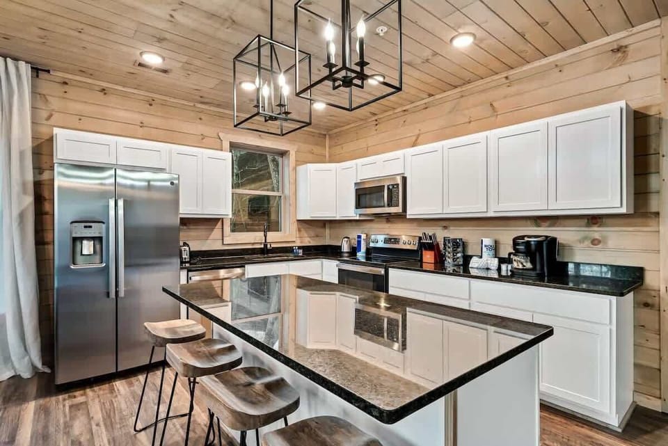 Modern stainless steel appliances and sleek granite countertops make cooking a joy!