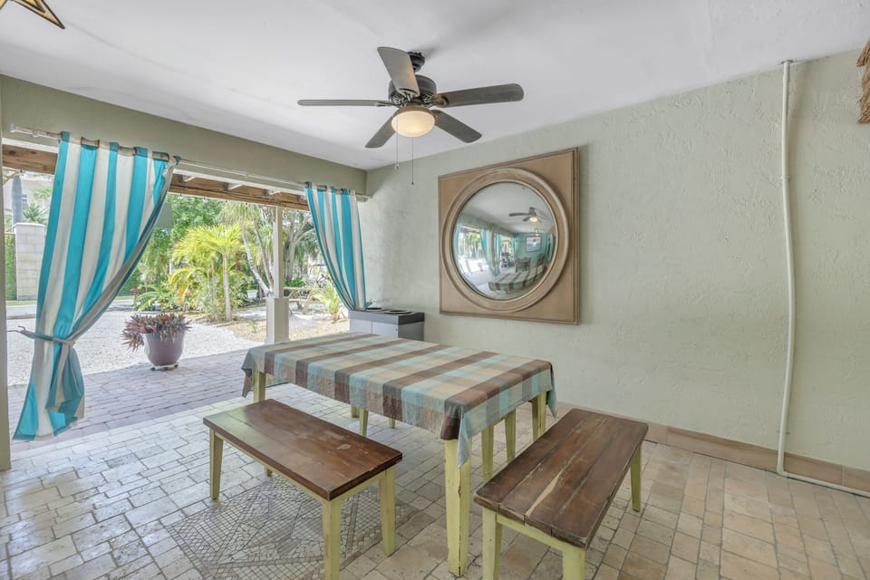Private covered patio and lounging area.