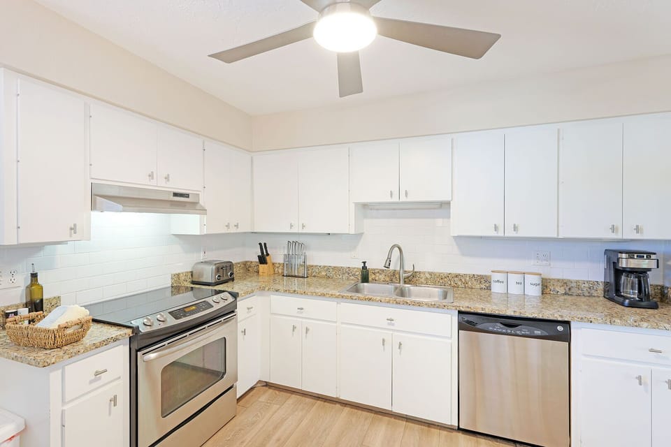 Eat in kitchen with all major and minor appliances, and lots of counter space.