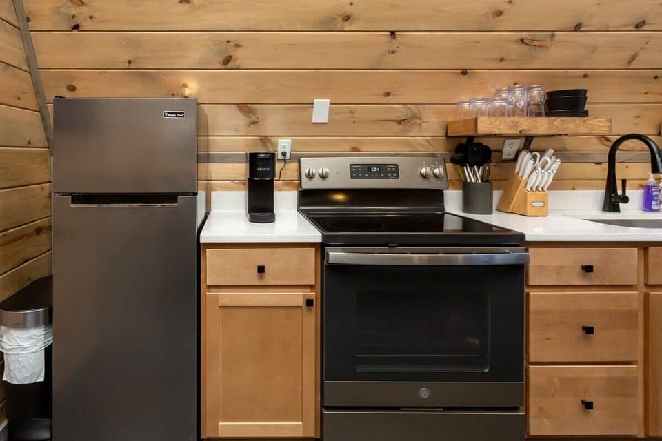 Kitchen Complete With Quartz Countertops And Stainless Steel Appliances!