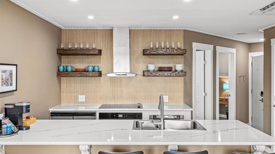 Updated chefs kitchen with open shelving.