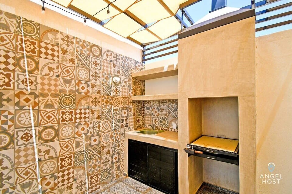 BBQ area, perfect for grilling and enjoying outdoor meals with friends and family.