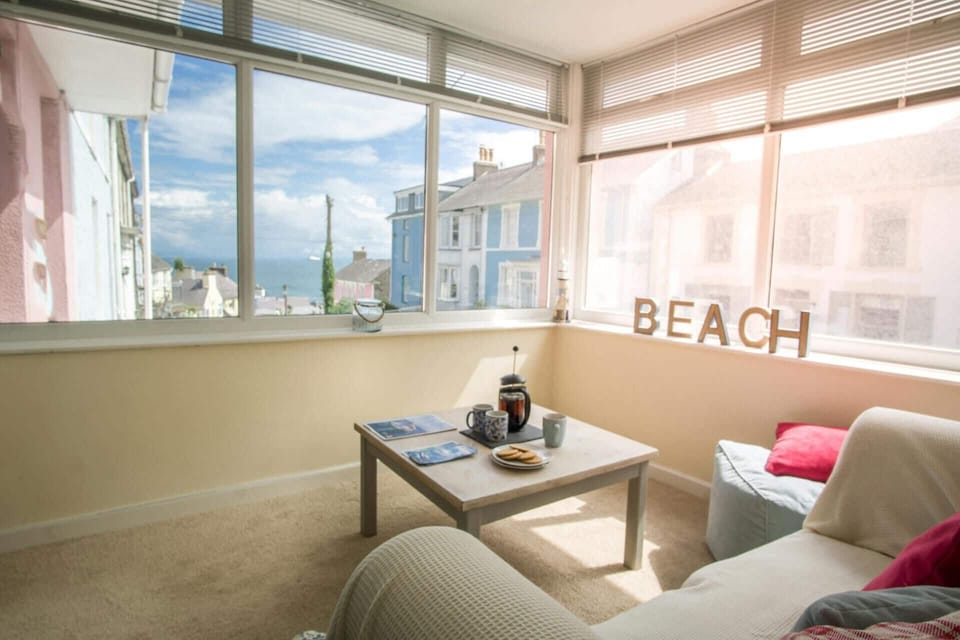 Sea views from the sitting area: sofa and coffee table