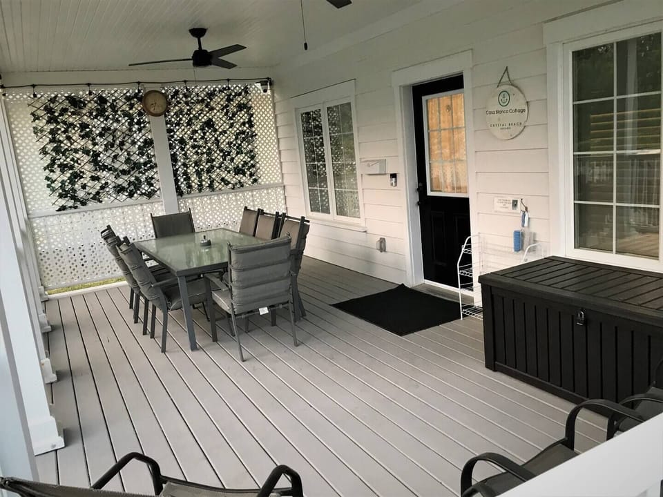 Large front porch.  Seating for 8+.  Ceiling fans to keep cool.