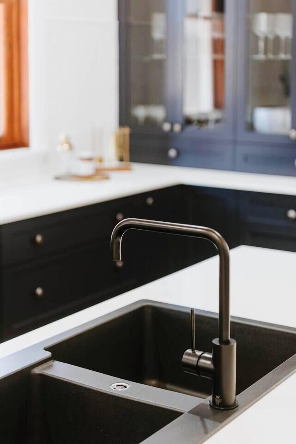 A double bowl sink makes it easy to wash up dishes.