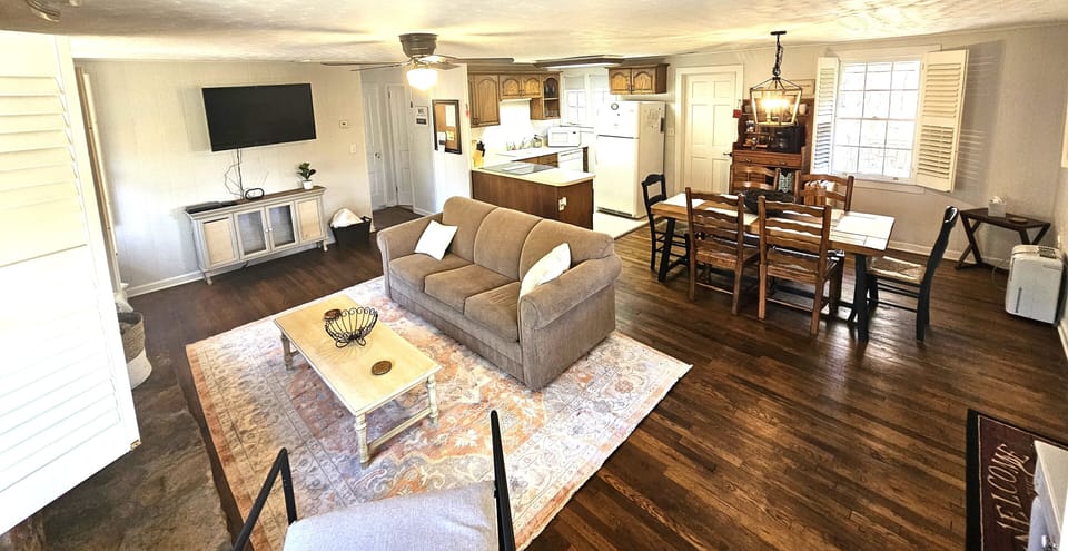 Pull out queen sofa bed to comfortably fit 6 people total.