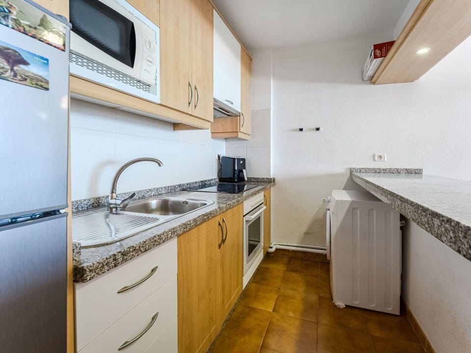 Apartment, Countertop, Wood Stain, Hardwood, Hotel, Resort, Cabinetry, Kitchen, Wood Flooring, Kitchen & Dining Room Table