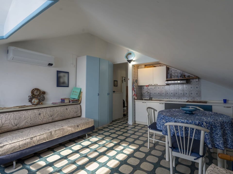 Furniture, Picture Frame, Wood, Living Room, Comfort, Building, Flooring, Floor, Houseplant, Hardwood