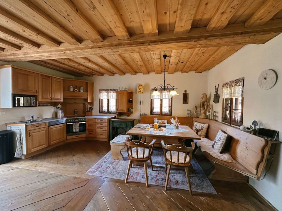 Table, Furniture, Wood, Couch, Interior Design, Cabinetry, Picture Frame, Window, Building, Flooring