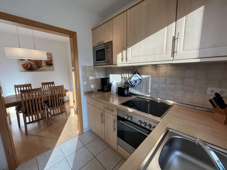 Cabinetry, Countertop, Furniture, Sink, Kitchen Sink, Tap, Kitchen Stove, Kitchen, Kitchen Appliance, Wood