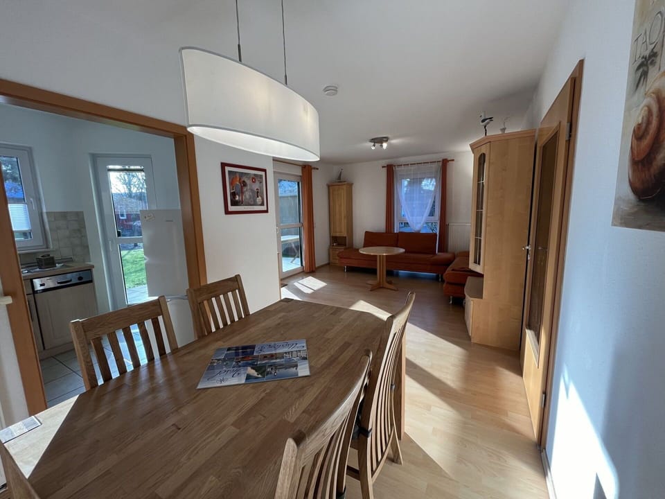 Furniture, Table, Picture Frame, Chair, Wood, Floor, Flooring, Real Estate, Hall