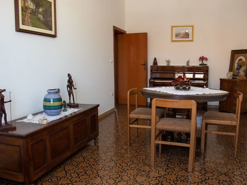 Picture Frame, Furniture, Table, Property, Wood, Interior Design, Cabinetry, Floor, Drawer, Chair