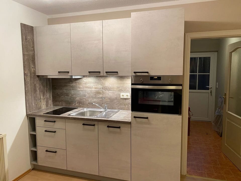 Cabinetry, Kitchen Sink, Sink, Countertop, Building, Wood, Kitchen Stove, Kitchen, Interior Design, Wood Stain