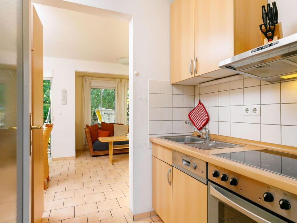 Cabinetry, Countertop, Property, Furniture, Sink, Wood, Kitchen Sink, Interior Design, Orange, Tap