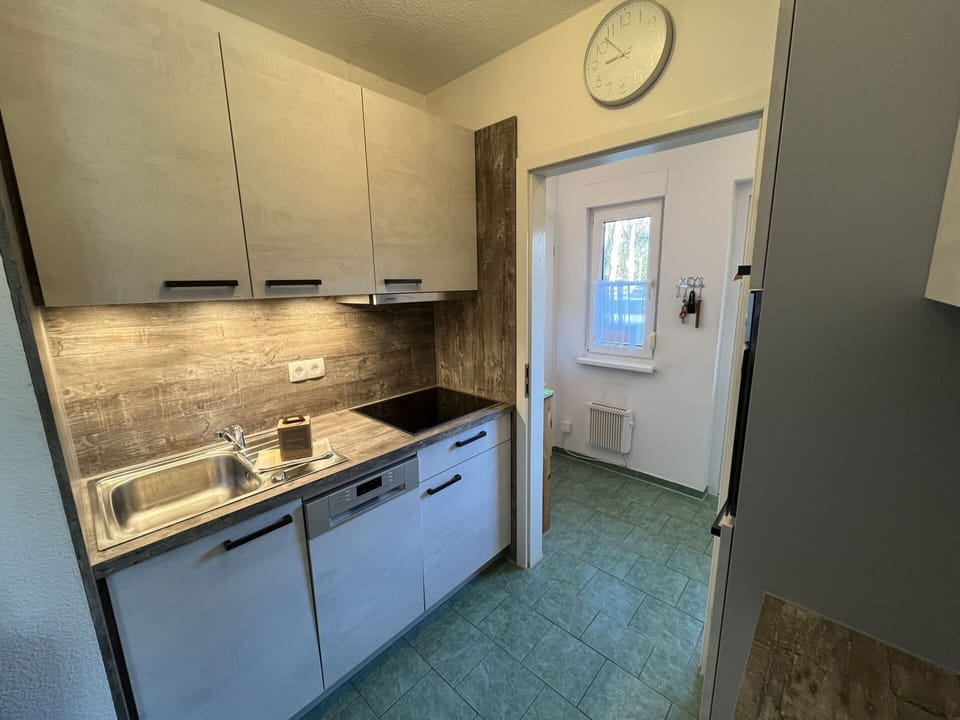 Cabinetry, Property, Kitchen Sink, Sink, Countertop, Building, Clock, Floor, Flooring, Kitchen Stove