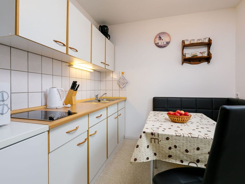 Cabinetry, Furniture, Property, Countertop, Table, Building, Mirror, Interior Design, Sink, Kitchen