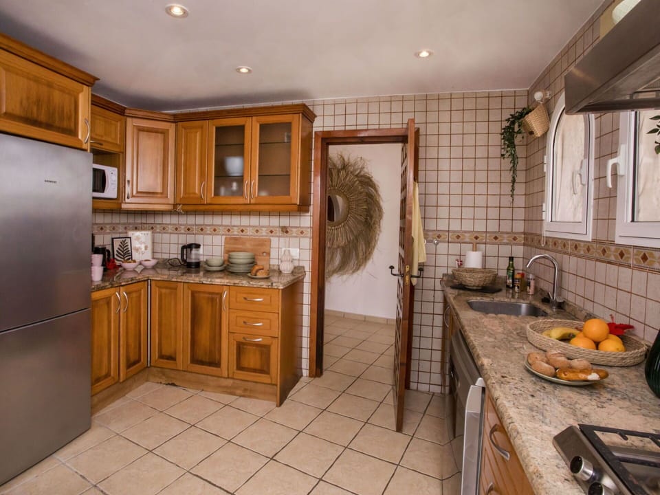 Cabinetry, Countertop, Property, Sink, Kitchen Stove, Building, Wood, Kitchen Appliance, Home Appliance, Kitchen