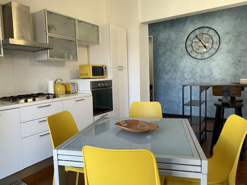 Table, Furniture, Property, Chair, Cabinetry, Kitchen Appliance, Wood, Interior Design, Yellow, Countertop