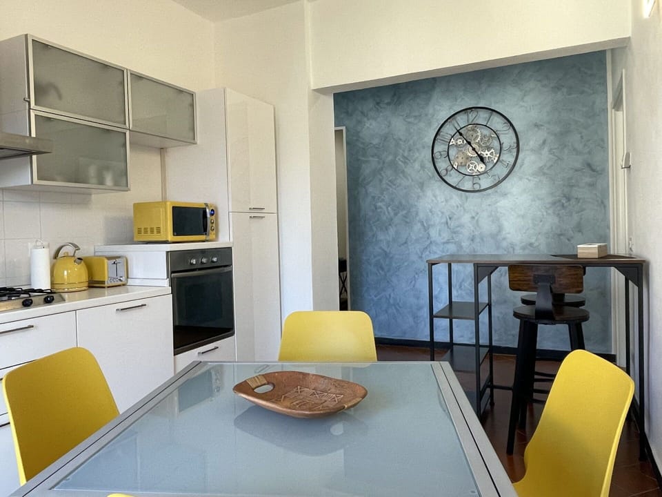 Furniture, Property, Table, Wood, Interior Design, Chair, Lighting, Kitchen Appliance, Orange, Flooring