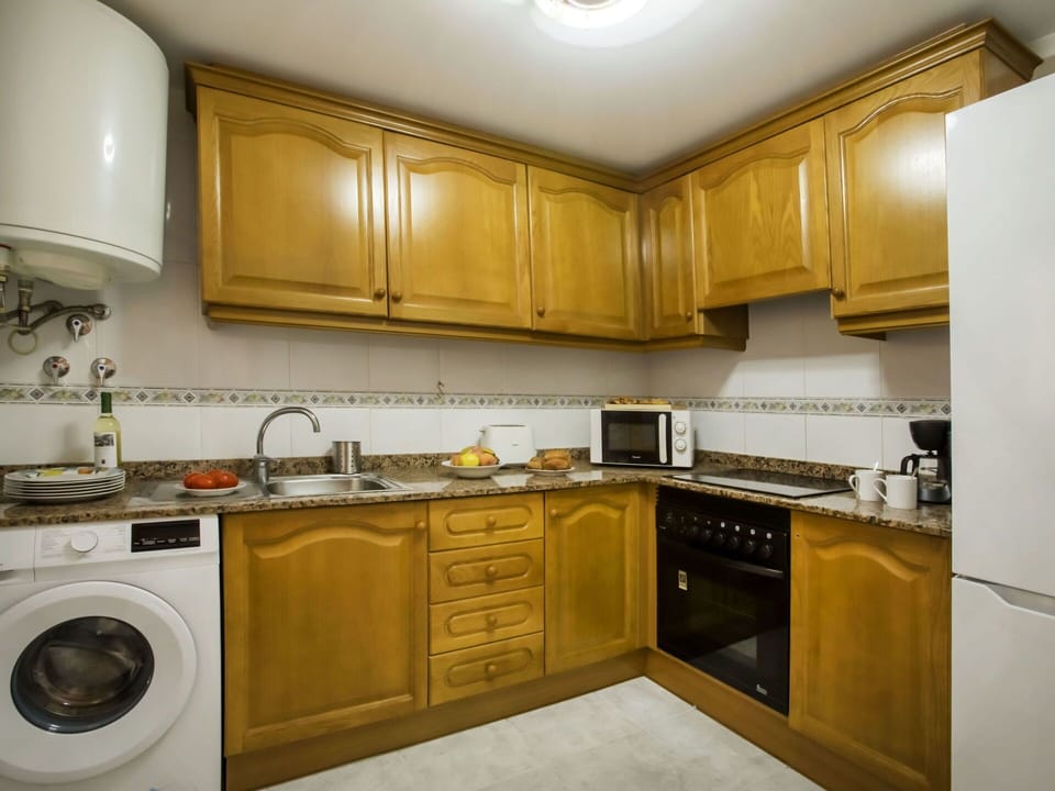 Cabinetry, Laundry Room, Property, Countertop, Sink, Kitchen Appliance, Kitchen Stove, Kitchen, Kitchen Sink, Tap