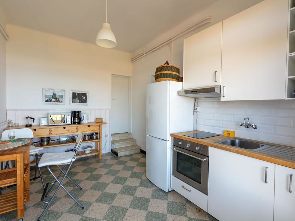 Furniture, Cabinetry, Property, Countertop, Wood, Kitchen Appliance, Drawer, Kitchen Stove, Interior Design, Kitchen