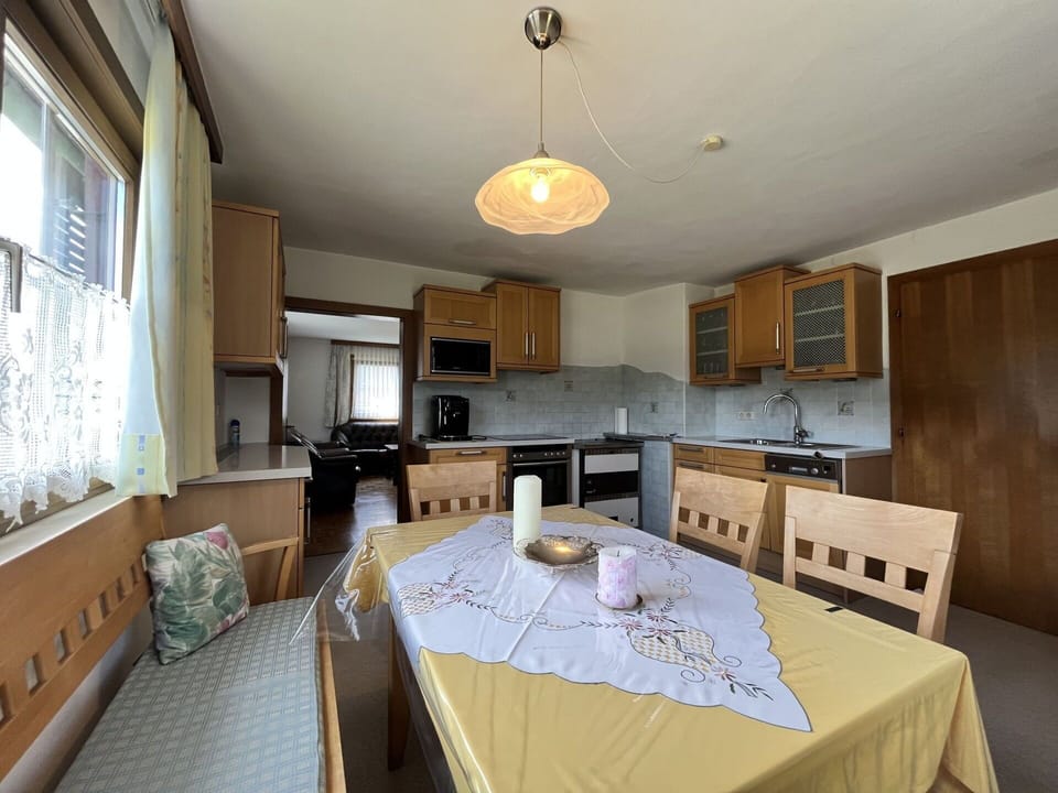 Cabinetry, Furniture, Property, Countertop, Table, Kitchen, Window, Wood, Lighting, Interior Design