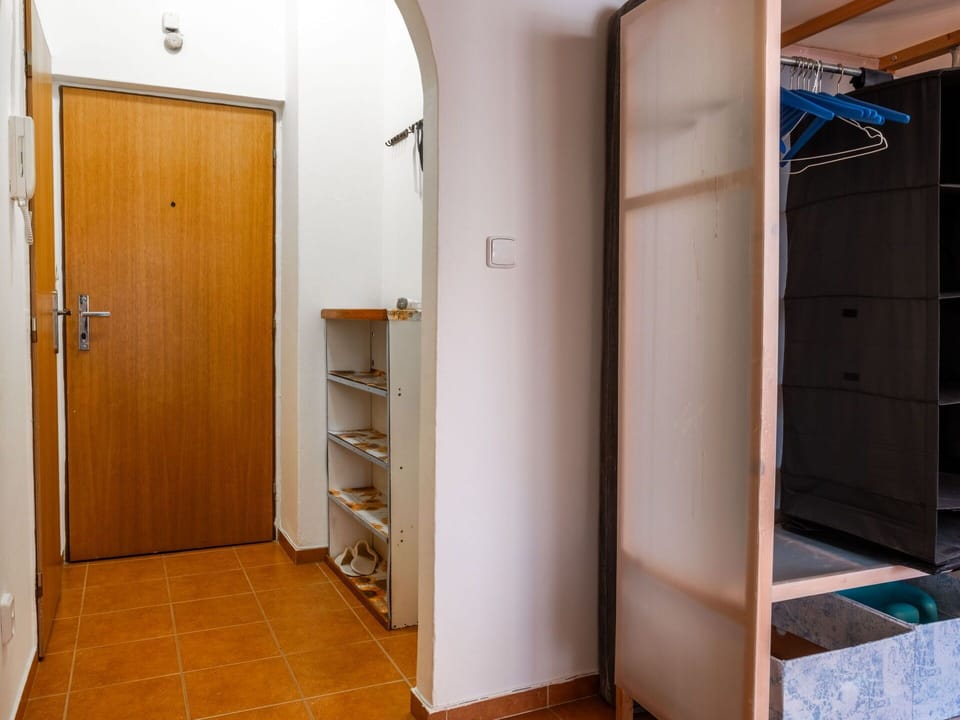 Flooring, Wall, Floor, Wood, Door, Interior Design, Room, Wood Stain, Shelving, Wood Flooring