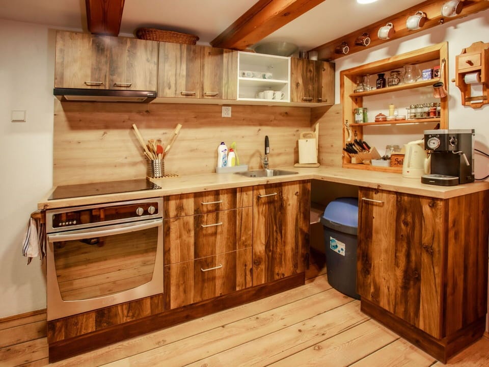 Countertop, Cabinetry, Kitchen Sink, Property, Furniture, Kitchen Appliance, Tap, Wood, Kitchen, Lighting