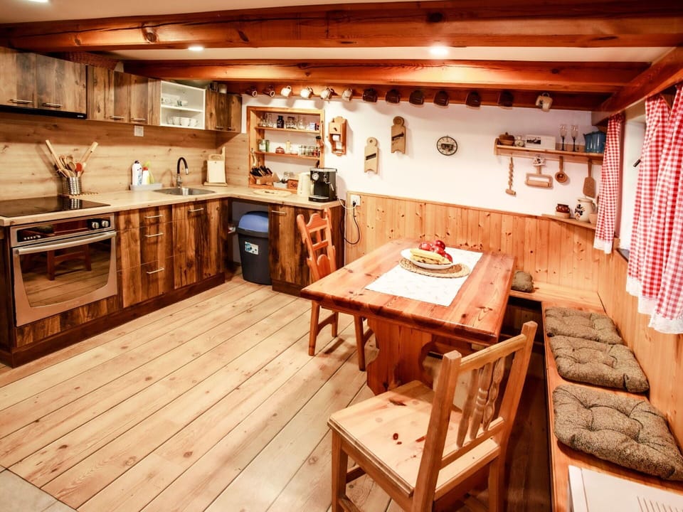 Furniture, Property, Cabinetry, Table, Countertop, Wood, Lighting, Interior Design, Kitchen Appliance, Curtain
