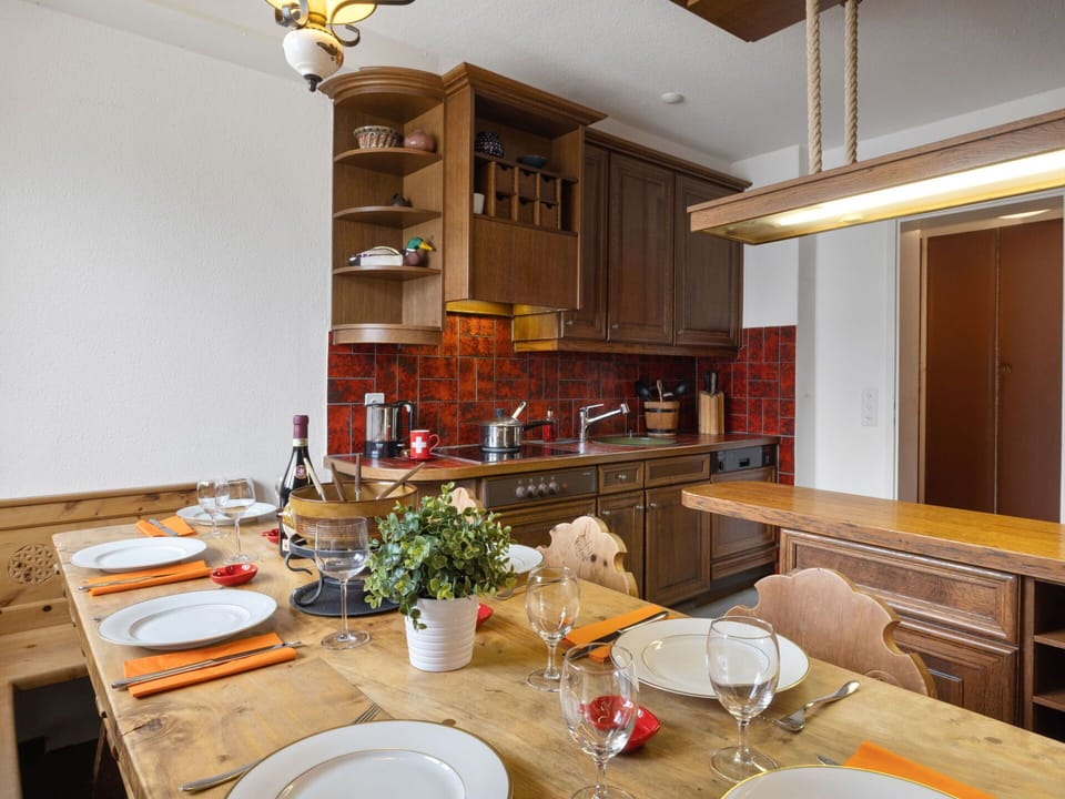 Furniture, Kitchen, Interior Design, Countertop, Cabinetry, Flooring, Wood, Ceiling, Light Fixture, Floor