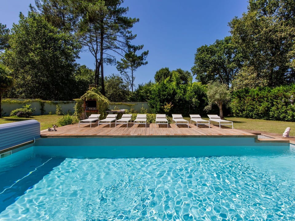 Water, Plant, Sky, Azure, Swimming Pool, Tree, Rectangle, Shade, Natural Landscape, Composite Material