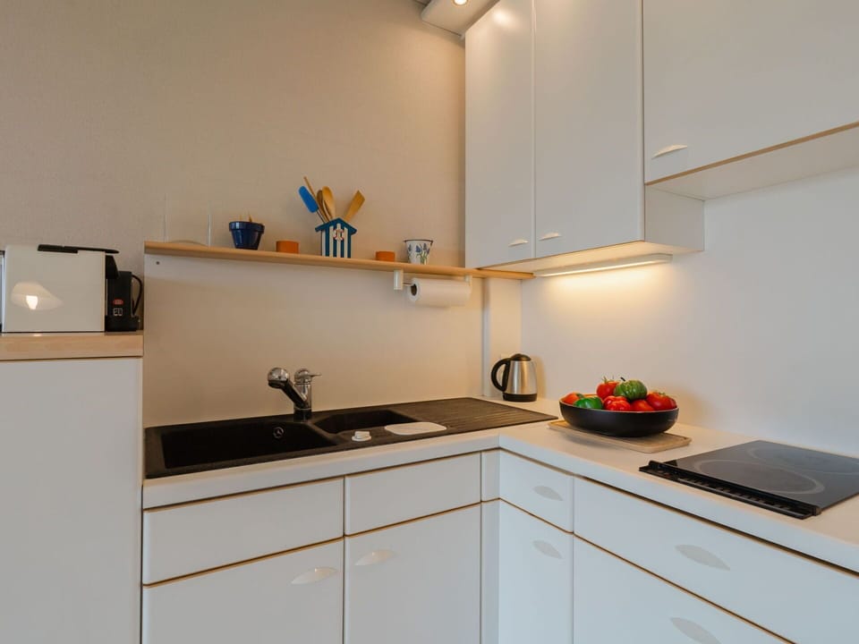 Kitchen Sink, Cabinetry, Countertop, Property, Sink, Tap, Kitchen Stove, Kitchen, Kitchen Appliance, Building