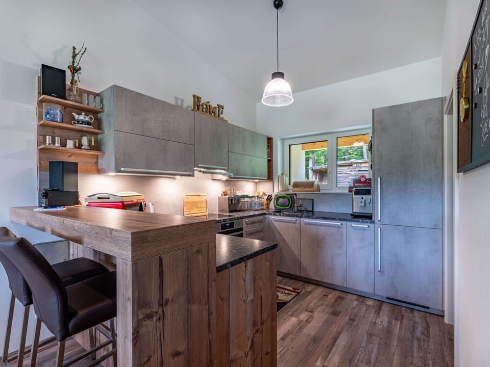 Cabinetry, Property, Countertop, Wood, Kitchen, Interior Design, Flooring, Table, Floor, Wood Stain