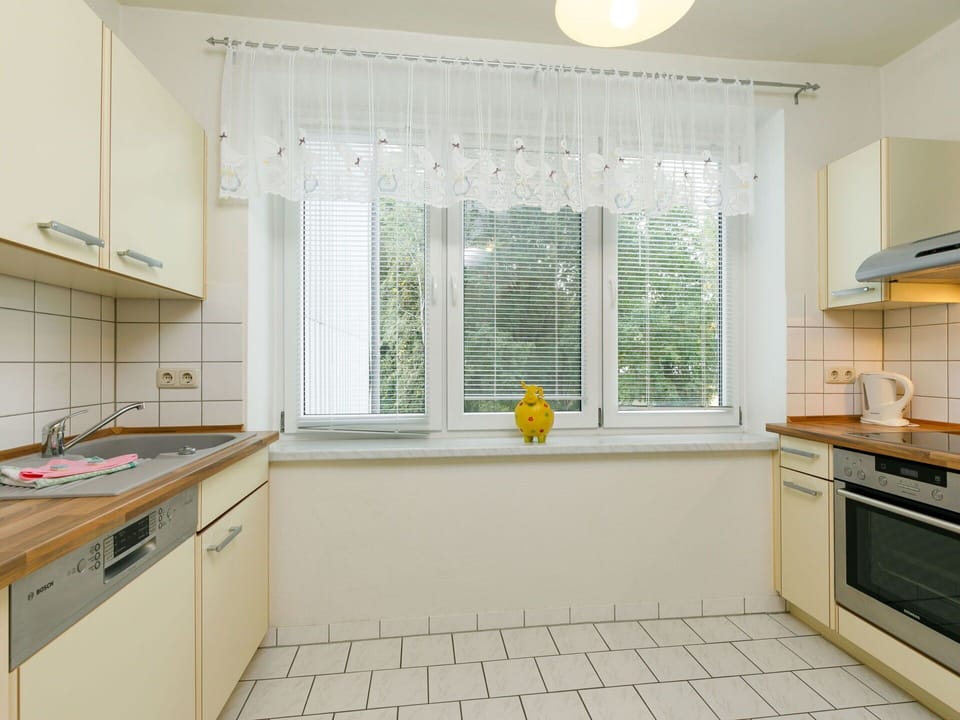 Cabinetry, Building, Countertop, Kitchen Sink, Window, Lighting, Kitchen, Interior Design, Wood, Plumbing Fixture