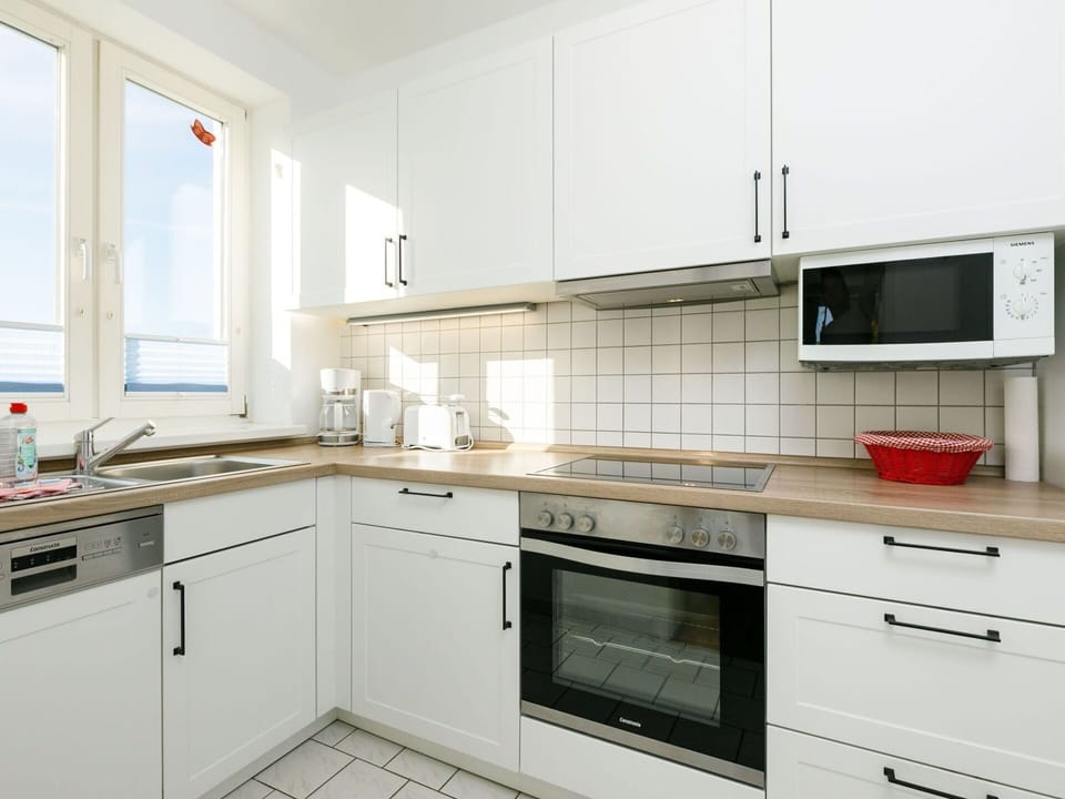 Cabinetry, Countertop, Building, Sink, Kitchen Stove, Kitchen Sink, Kitchen, Kitchen Appliance, Wood, Window