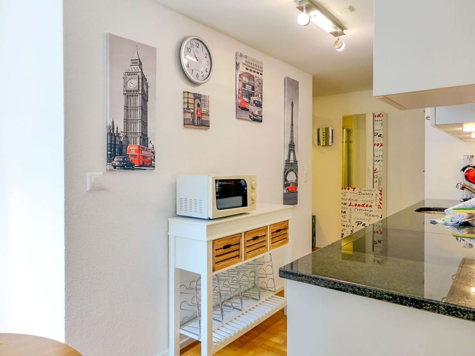 Furniture, Picture Frame, Interior Design, Cabinetry, Clock, Shelving, Wood, Shelf, Wall, Houseplant