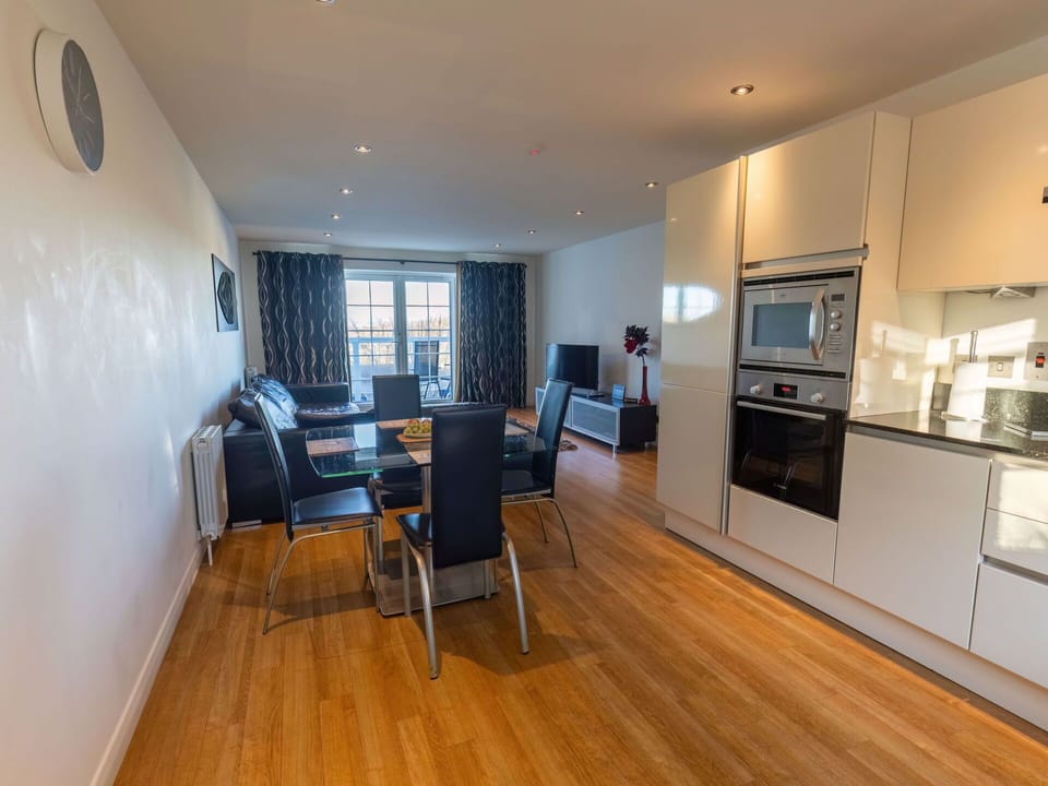 Lighting, Home Appliance, Television, Wood, Hall, Flooring, Floor, Building, Living Room, Kitchen Appliance