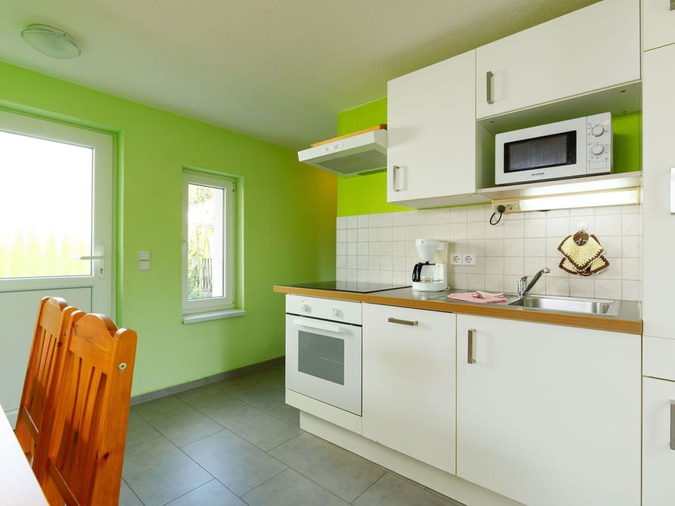 Cabinetry, Property, Furniture, Countertop, Building, Window, Kitchen Stove, Kitchen Appliance, Interior Design