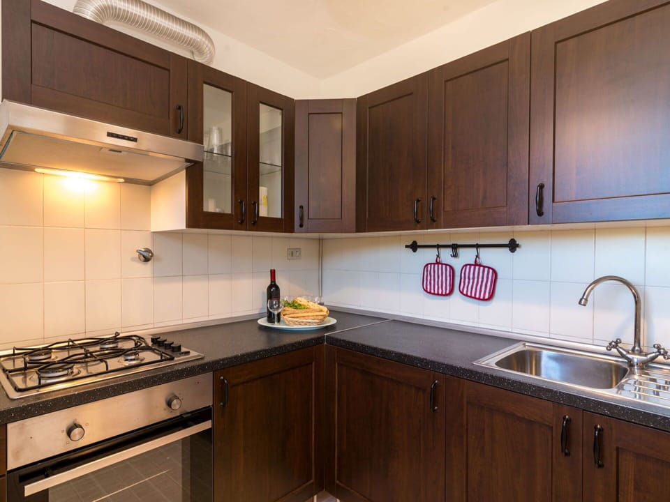 Brown, Cabinetry, Countertop, Kitchen Sink, Property, Building, Sink, Kitchen, Tap, Wood