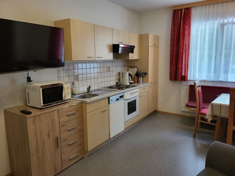 Cabinetry, Countertop, Property, Sink, Furniture, Kitchen Sink, Window, Building, Kitchen Stove, Kitchen Appliance