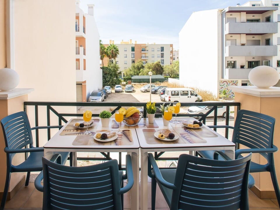 Table, Furniture, Chair, Tableware, Building, Dishware, Window, Outdoor Table, Sky, Outdoor Furniture