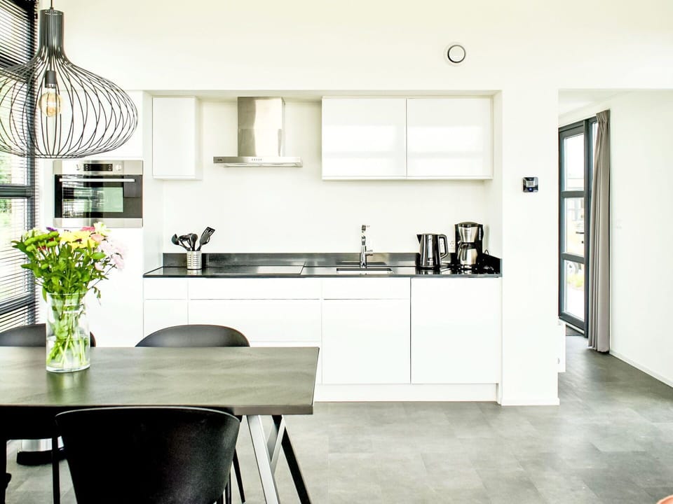 Furniture, Cabinetry, Countertop, Table, Plant, Interior Design, Flooring, Kitchen, Wood, Floor