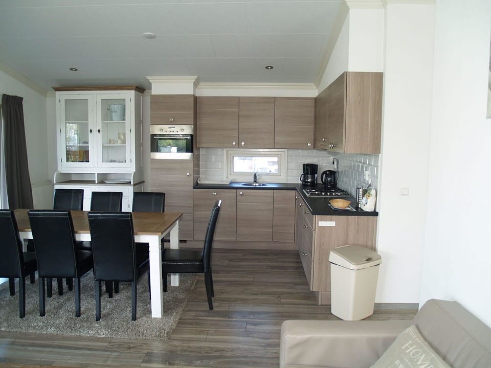 Cabinetry, Countertop, Chair, Kitchen, Building, Wood, Floor, Flooring, Window, Kitchen Stove